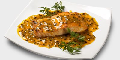 Salmon with passion fruit sauce.